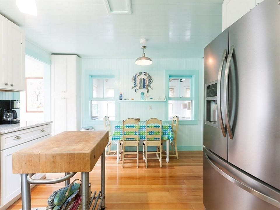 New Kitchen w breakfast table, stainless fridge