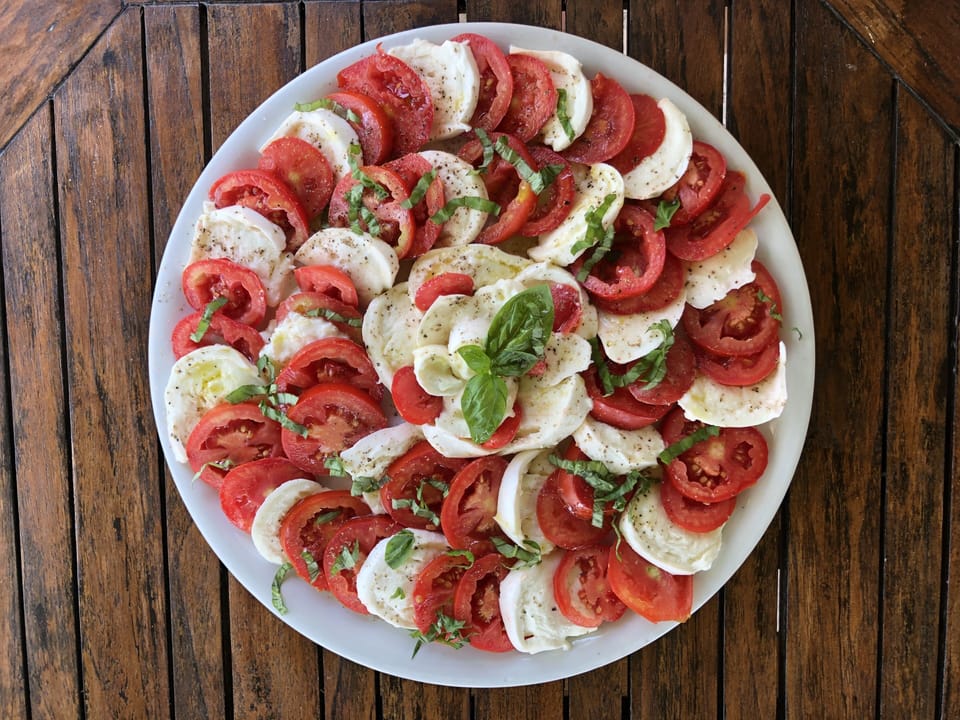 Local mozzarella, with fresh tomato and basil
