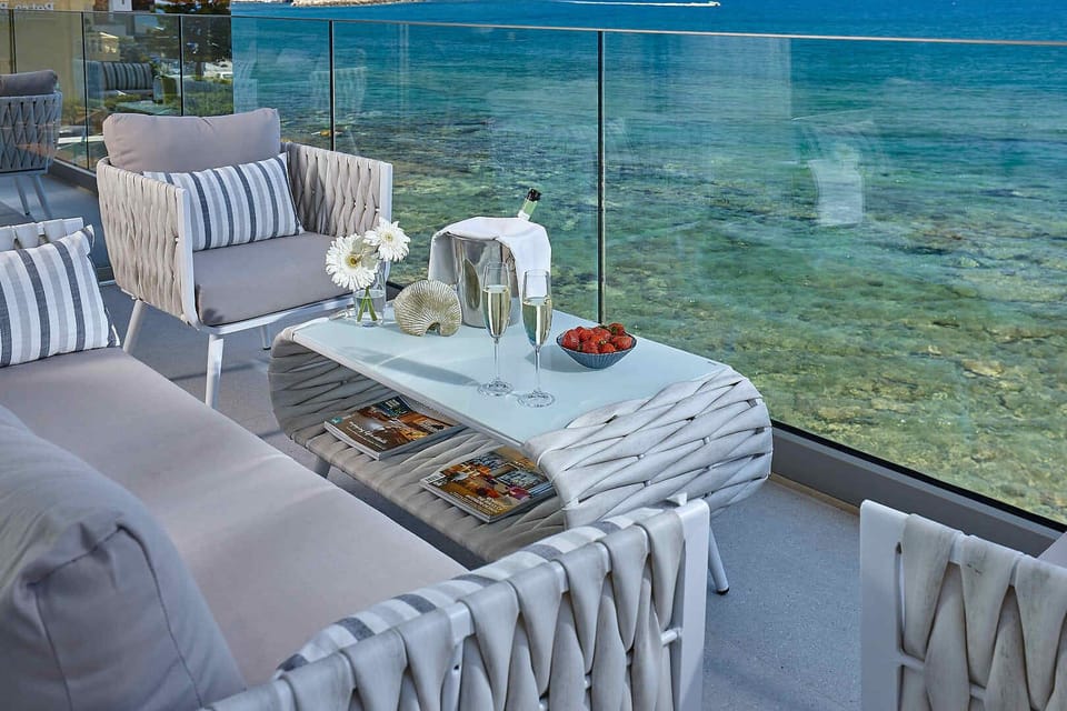 view from the glassfront balcony at crystalclear sea