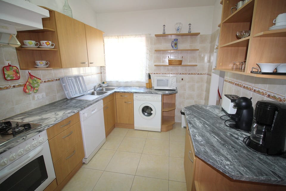 Great, well equipped kitchen with a pantry  the end on the right