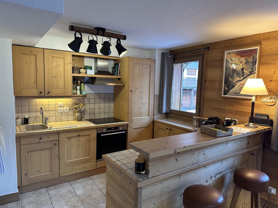 Fully equipped kitchen with new modern amenities.