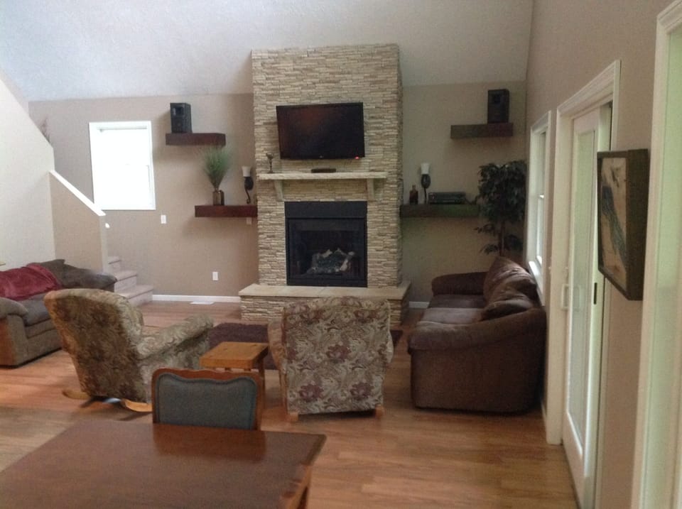 Beautiful gas fireplace with TV above. 