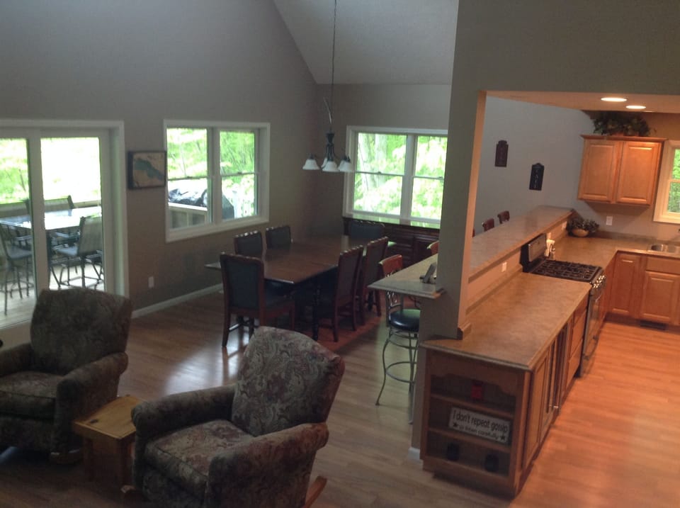 Open concept living space with access to covered patio
