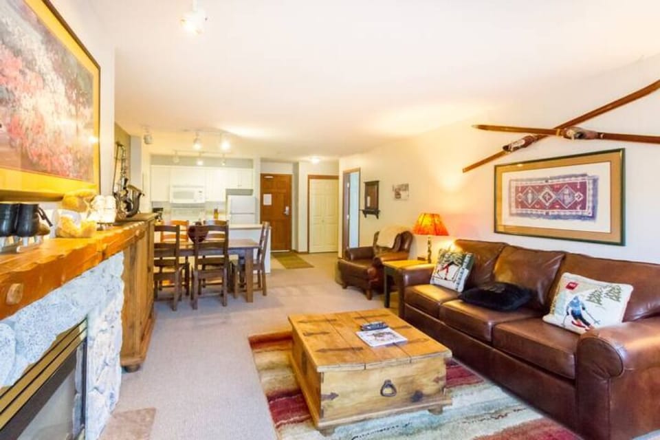 Great living room with access to a huge wrap-around balcony and a BBQ