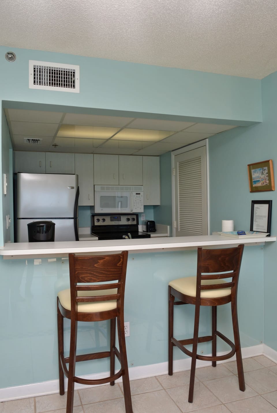 Seating for two at breakfast bar.