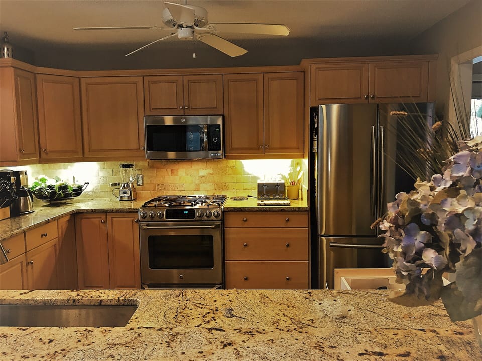 Brand new appliances and granite in fully equipped kitchen,