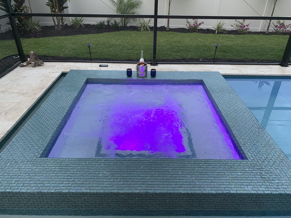 Relax in the hot tub under the Florida stars