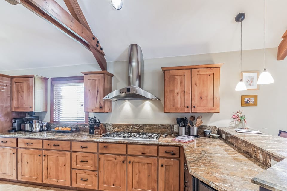 Meticulously appointed kitchen on main floor with all essential supplies
