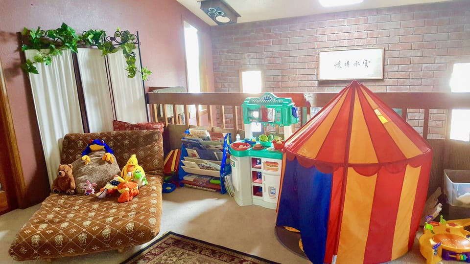 Children's play-loft fully equipped with toys and books galore!
