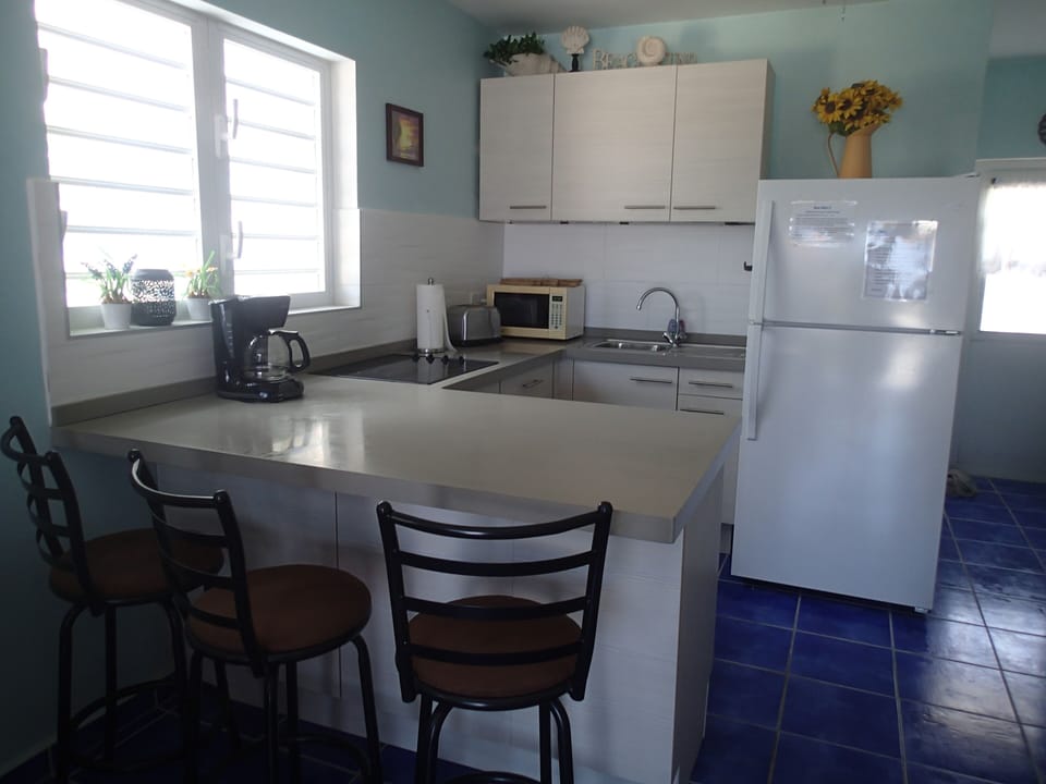 Remodeled kitchen with bar.