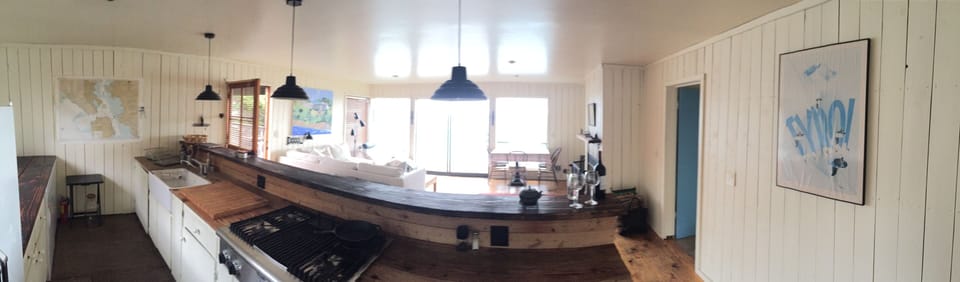 Living Room with kitchen area. Click to see wider angle image.