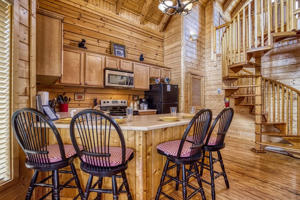Cabin in the Smokies "River Cabin" - Bar top and spiral staircase