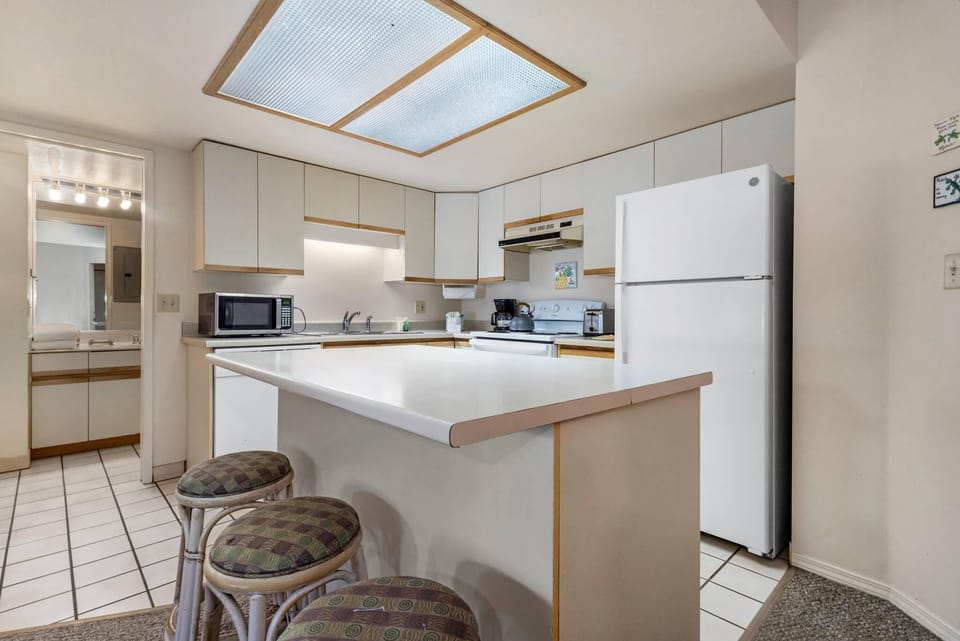 Fully equipped kitchen includes pots, pans, utensils, plates, silverware, etc.