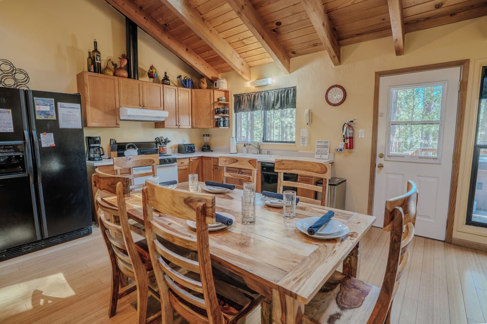 Enjoy family dinners or group meals in the inviting dining room, designed to complement the open layout.