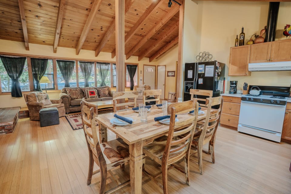 Enjoy family dinners or group meals in the inviting dining room, designed to complement the open layout.