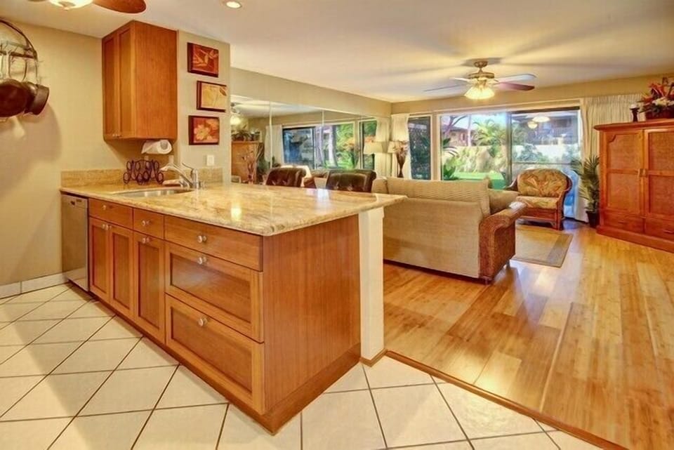Fully stocked kitchen. Granite countertops and bamboo floors. New furnishings.