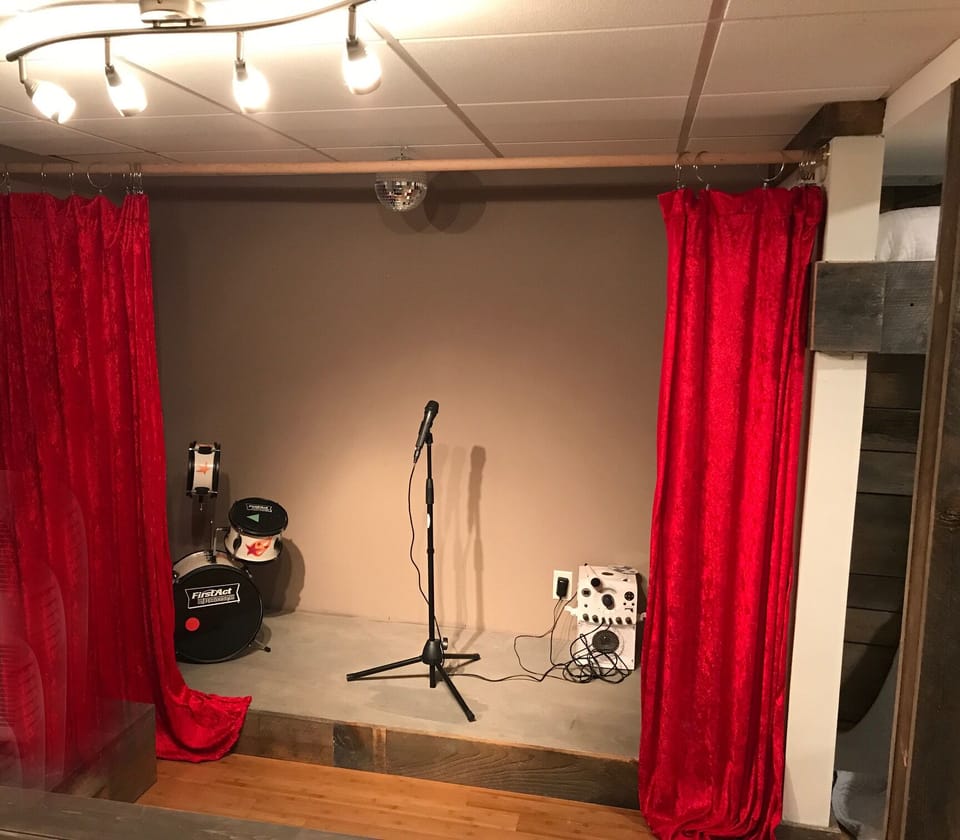 Kids can "put on a show" in the small stage located in the bunk room.