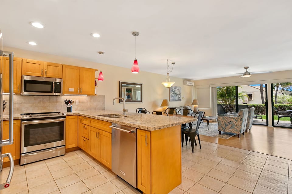 Nicely renovated kitchen with stainless steel appliances.