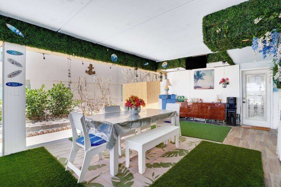 Pool Lounge area. This is a shared area with TV, Sofa, dining table and games.