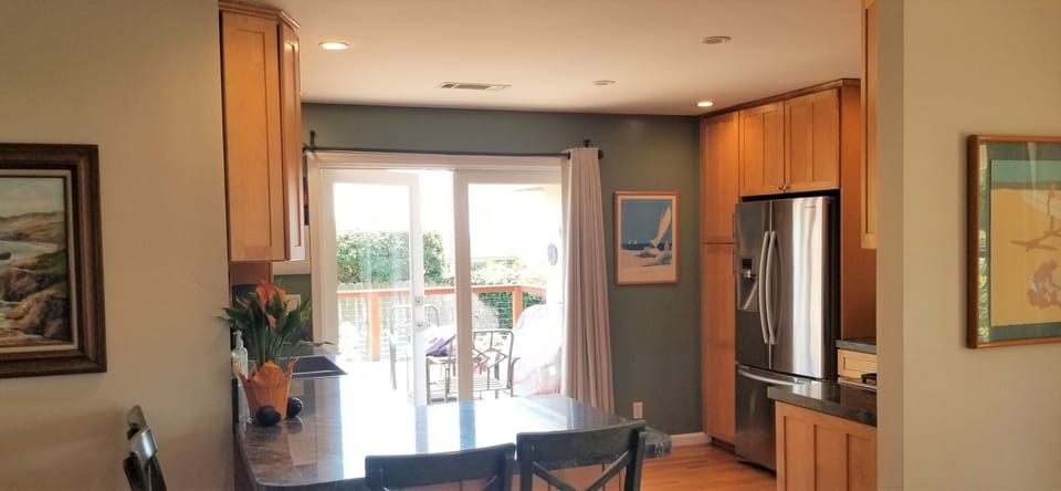 French Doors to the ocean view deck Easy Access to the kitchen and back yard.