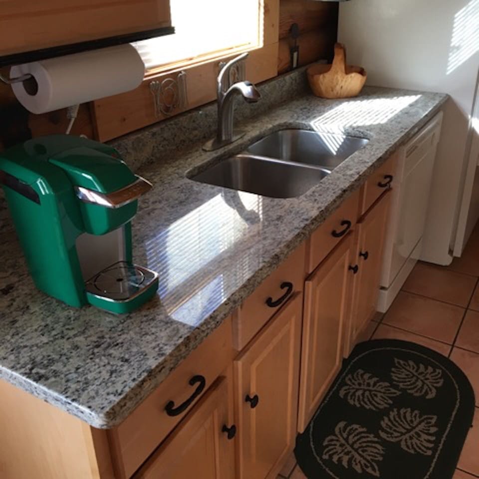 full kitchen; pots & pans, dishes; single serve Keurig coffee maker
