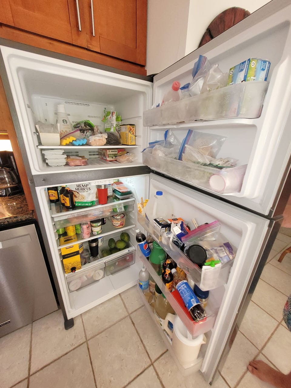 New in 2023 larger fridge is over 20 cu ft!  Food not included.