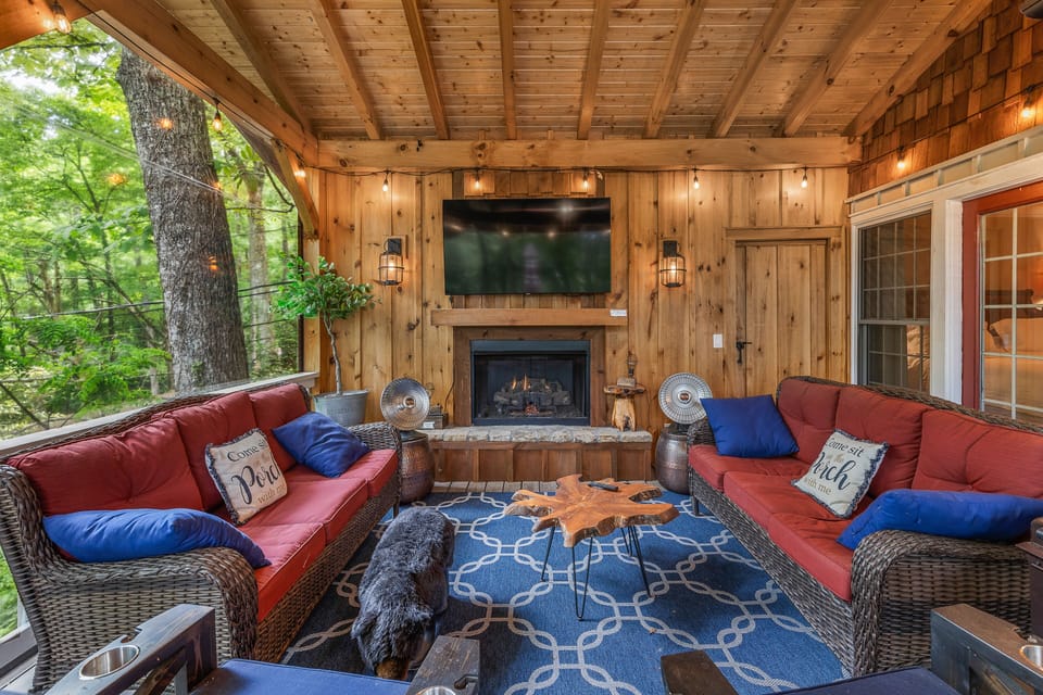Relaxing covered porch w/TV & fireplace
