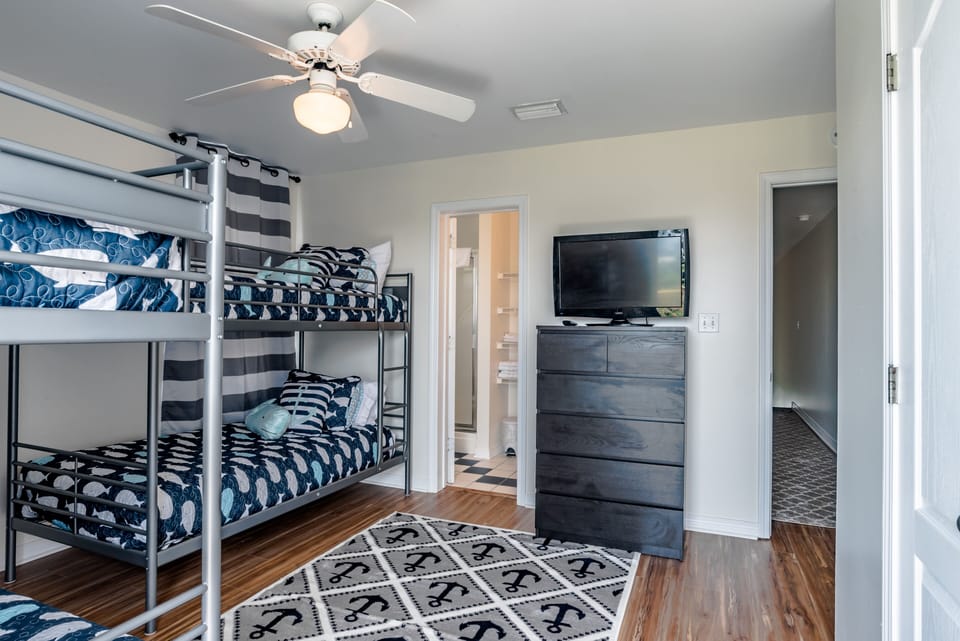bunk bed room has flatscreen TV with ensuite bathroom.