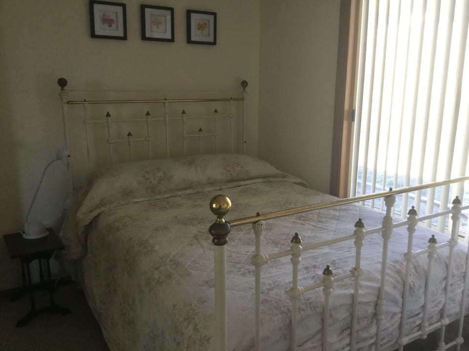 3rd bedroom 
Double brass bed