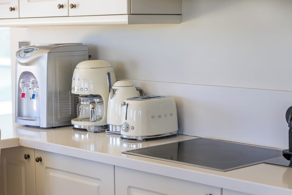 Your Kitchenette features chic SMEG appliances and a top-quality water filter for total convenience