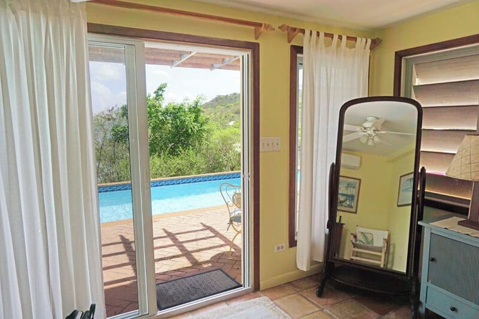 and looks out to the pool