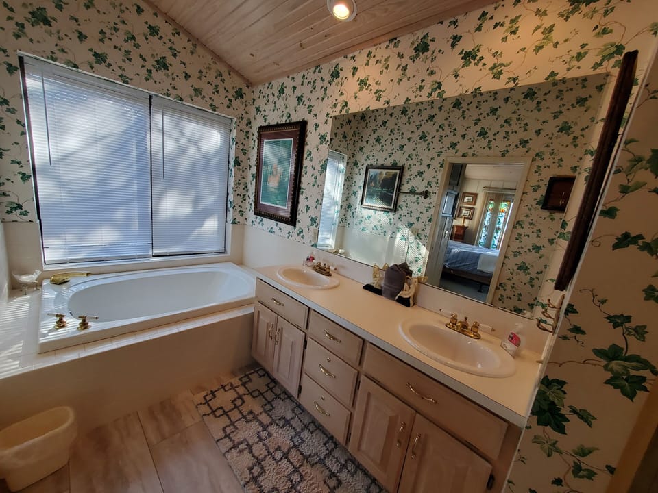 Master Bathroom has a whirlpool tub and a walk-in shower.