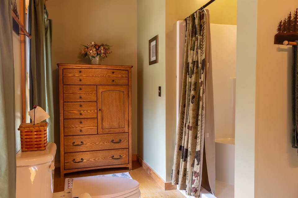 The loft bedroom has its own full bathroom