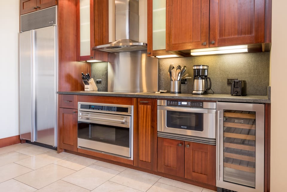 Cook meals with high-end appliances, including a wine cooler.