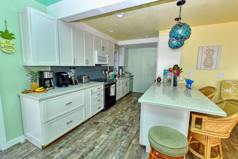 Open kitchen with Japanese Net fishing buoys lights 
