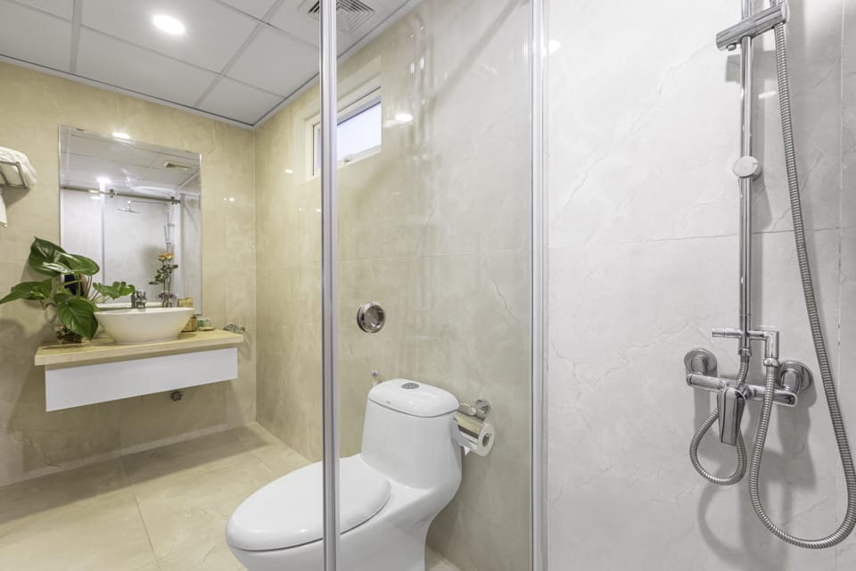 Shower, free toiletries, slippers