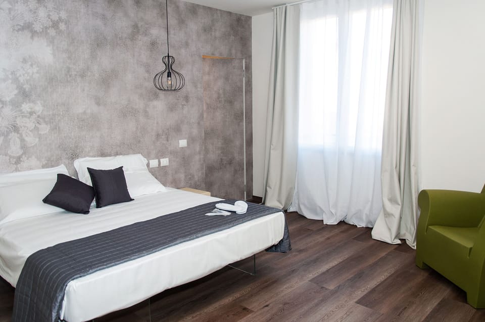 Exclusive Double Room, 1 King Bed with Sofa bed, Non Smoking, City View | Premium bedding, down comforters, memory foam beds, minibar