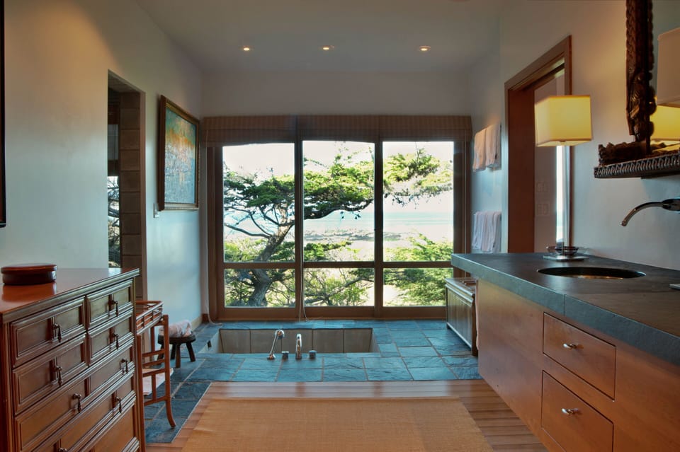 Sunken Tub and Shower (on left) in Master Suite bath with ocean view