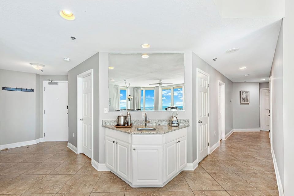 Wet bar w/a variety of plasticware for delicious smoothies or cocktails.