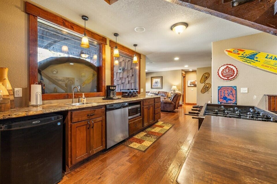 Lower level wetbar, foosball area, mini fridge