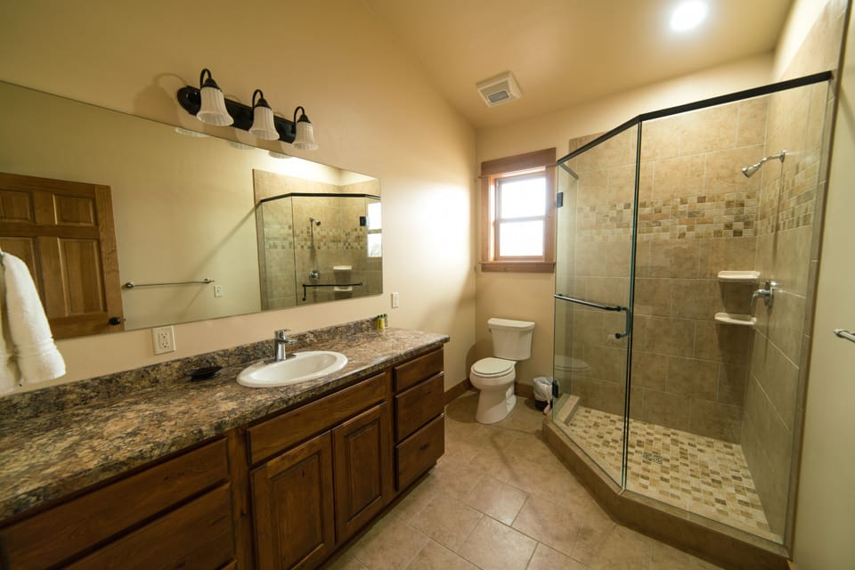 Bathroom:  Shower, camode, sink