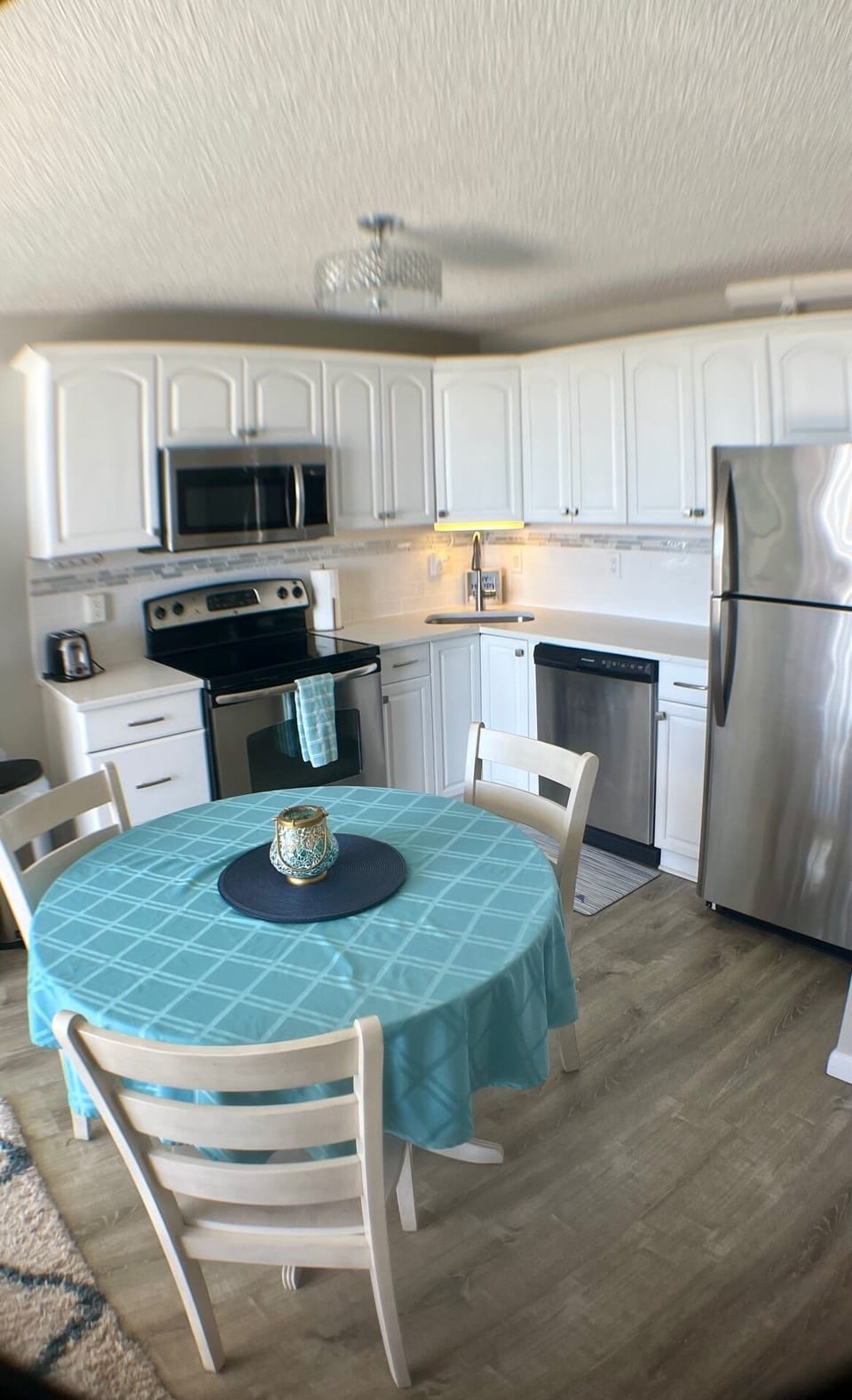 Kitchen area w new quartz counters installed fall 2025