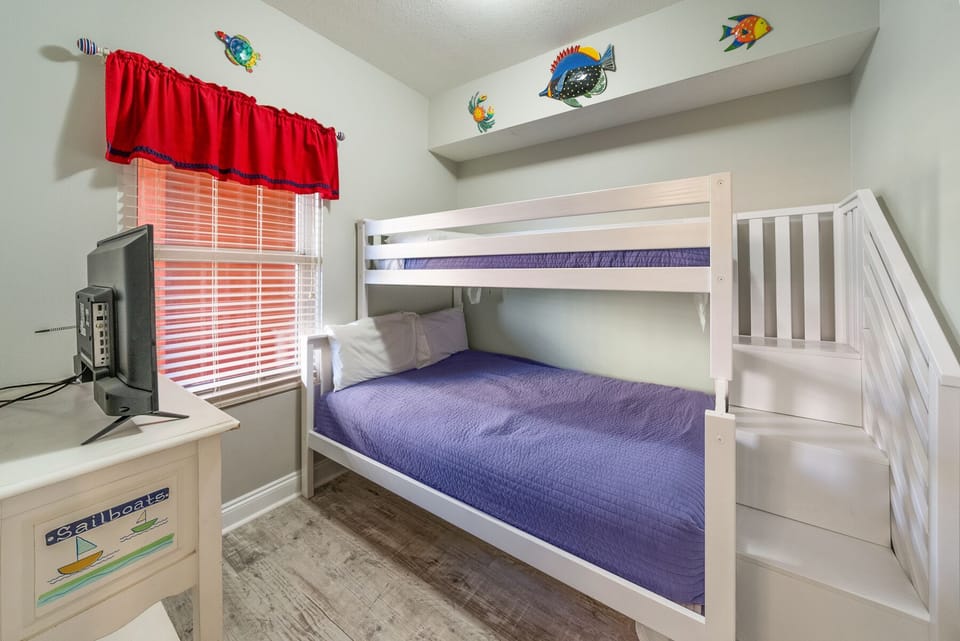 Double on bottom, twin on top in the bunk room
