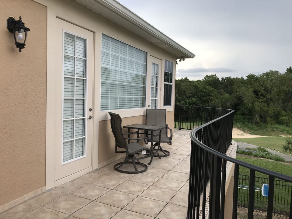 Outdoor balcony seating area, perfect for morning coffee