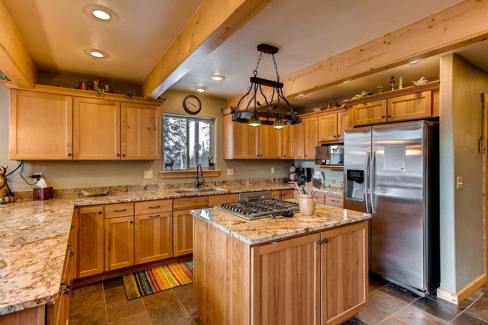 This newly remodeled kitchen has only the best appliances and the granite is gorgeous. It is a very high end and state of the art kitchen.