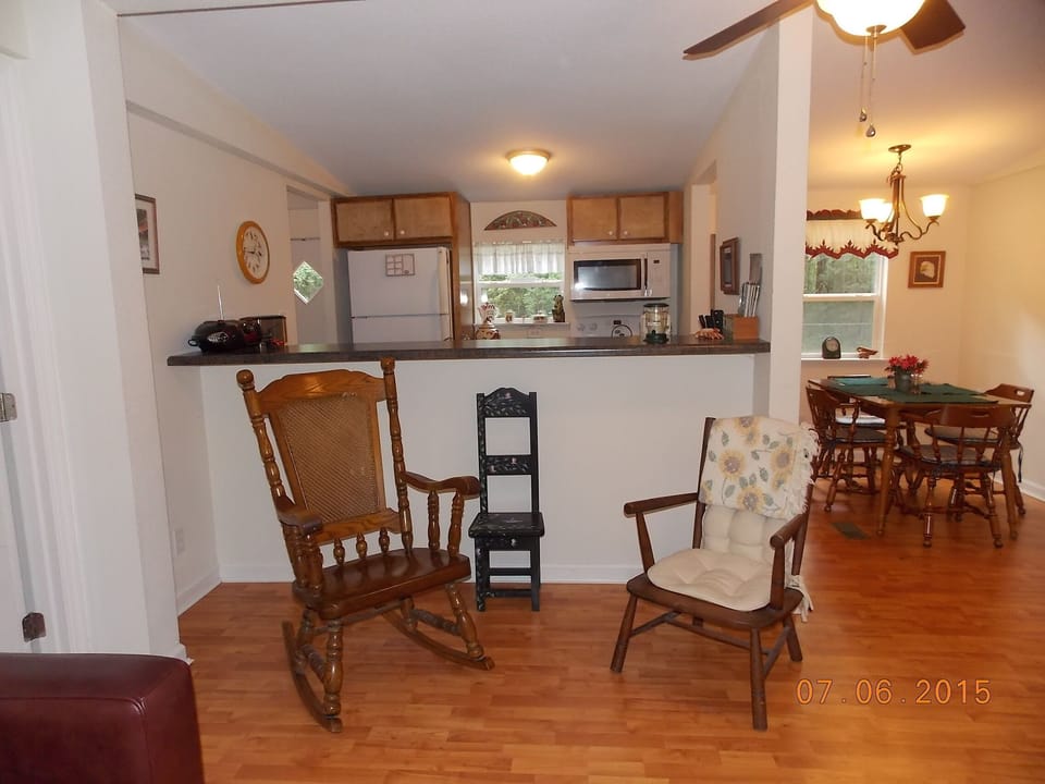 Bar between kitchen and living room for setting up food.
