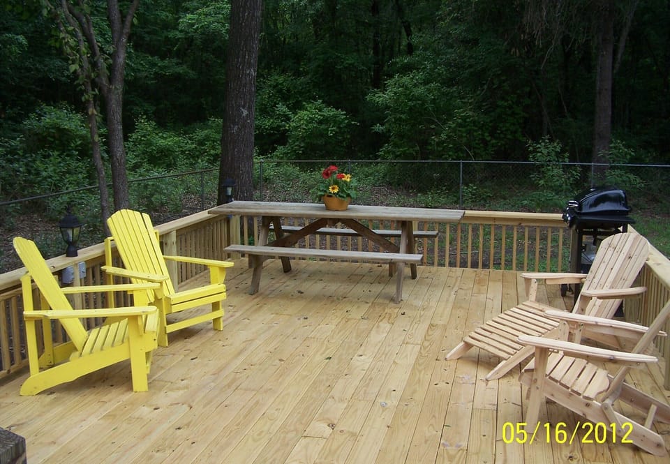 Relax on the deck while you  cook your favorite food on the gas grill.