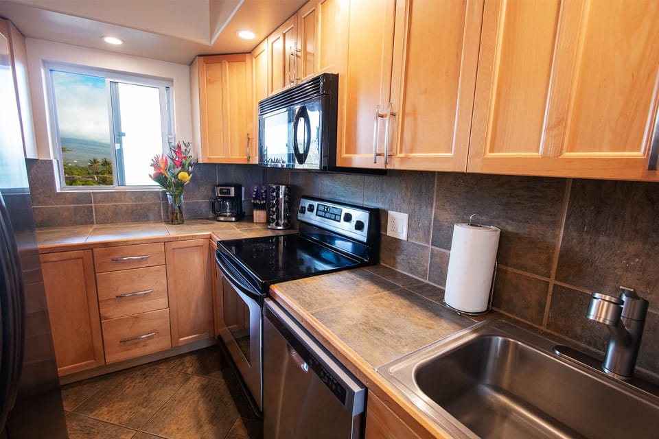 Kitchen fully stocked. Cook amazing meals and eat on the lani or dining table. 