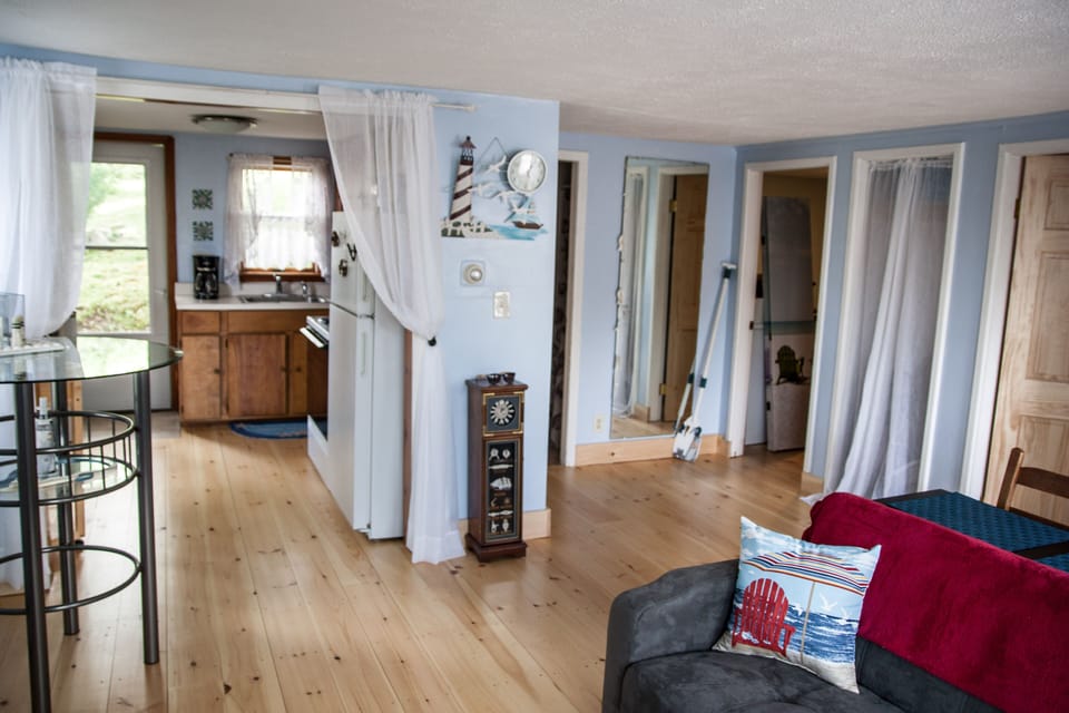 View to the Kitchen (high top has been replaced with kitchen table)