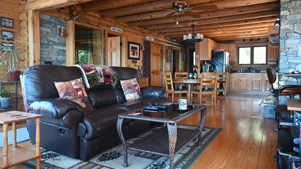 View of living, room, dining room, and kitchen.